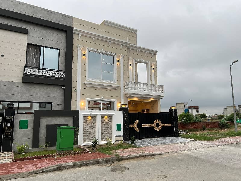 5 marla brand new house orignal picture and price 100% hot location 1