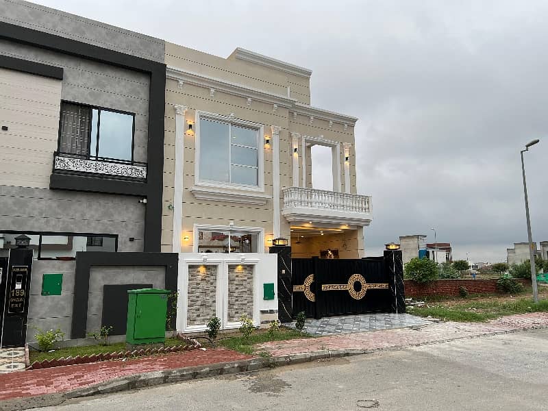 5 marla brand new house orignal picture and price 100% hot location 7