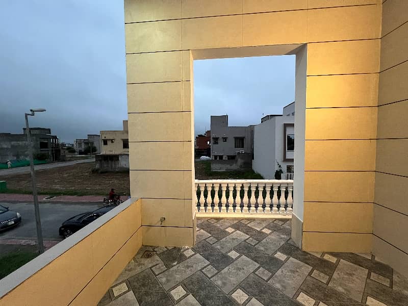 5 marla brand new house orignal picture and price 100% hot location 16