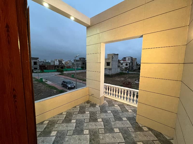 5 marla brand new house orignal picture and price 100% hot location 17