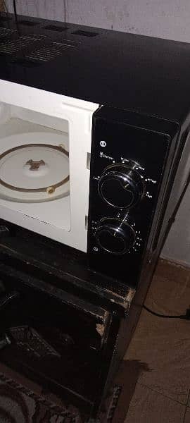 Ecostar Microwave oven All ok urgent sell 4 month use All ok 3