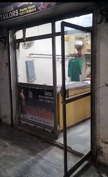 glass door with iron frame in good condition urgently for sale 1