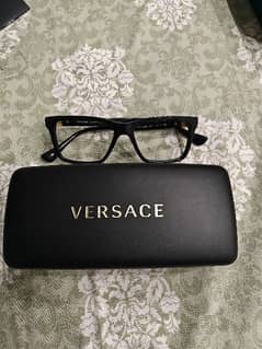 Original Versace frame.