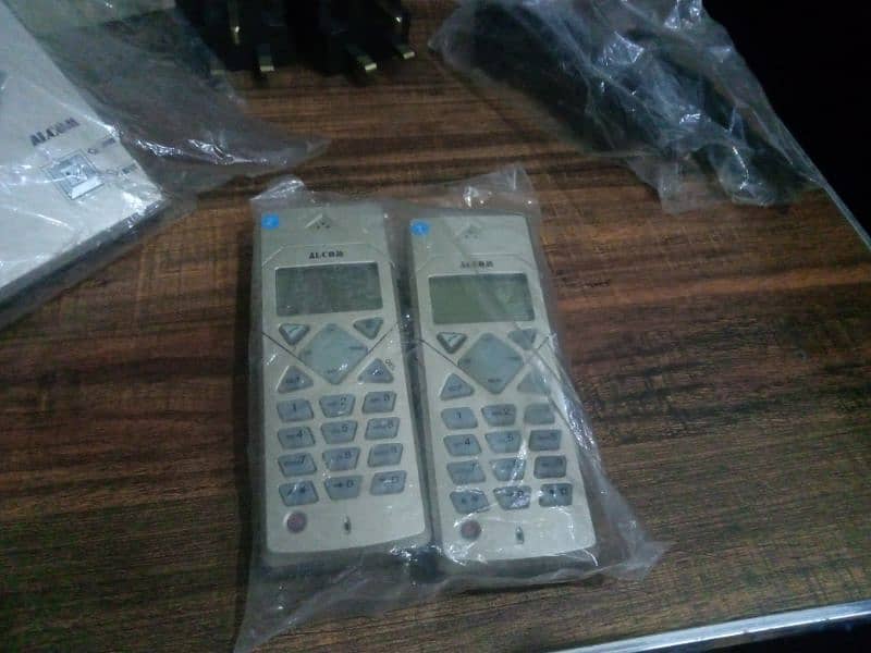 alcom cordless phone with box and accessories 1