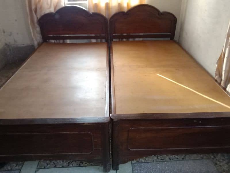 Single wooden beds 10