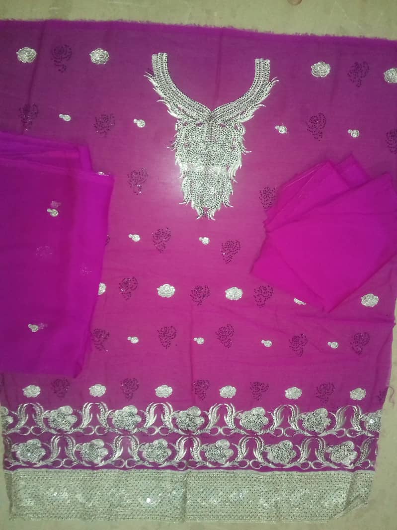 Unstitched ladies embroidy suits 1