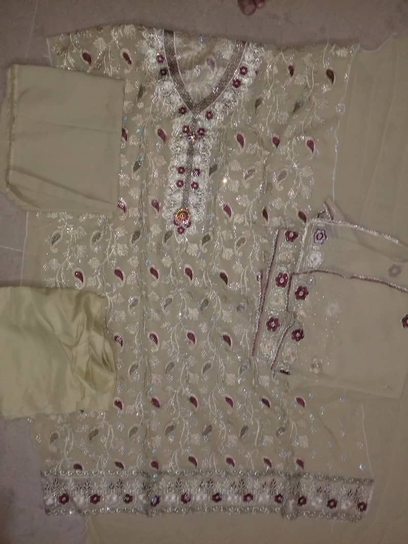 Unstitched ladies embroidy suits 3