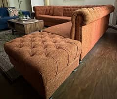 L shaped rust sofa