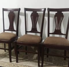 6 Wooden Dining Chairs.