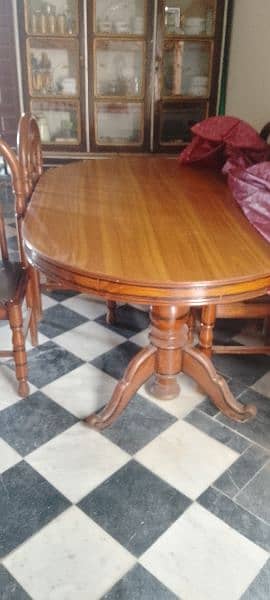 dining table with four chairs in a very good condition 1