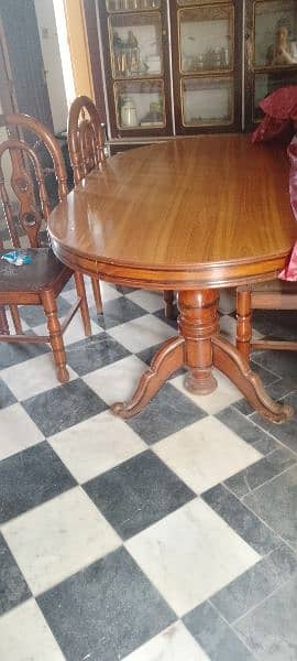 dining table with four chairs in a very good condition 2