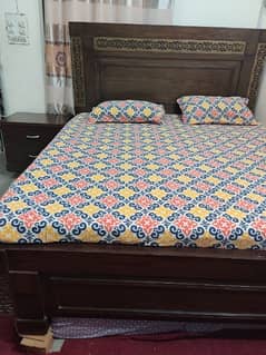 king size bed with 2 side tables