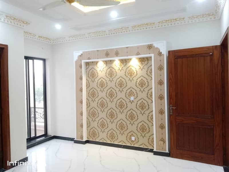 10 MARLA CORNER BREAD NOW LUXURY SPANISH HOUSE AVAILABLE FOR SALE IN FORMANITES HOUSING SCHEME BLOCK -N LAHORE. 26