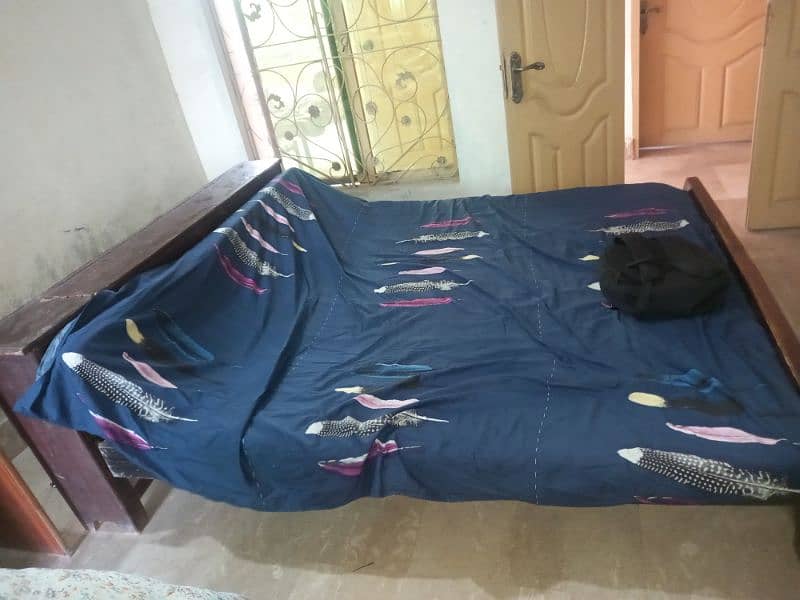 used wooden bed 2