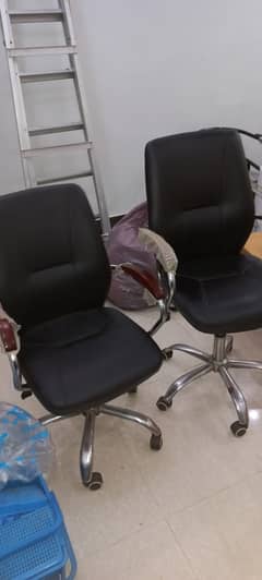 2 black revolving chairs + 1 damaged brown revolving chair