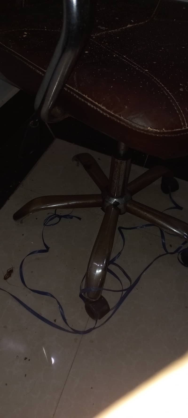 2 black revolving chairs + 1 damaged brown revolving chair 3