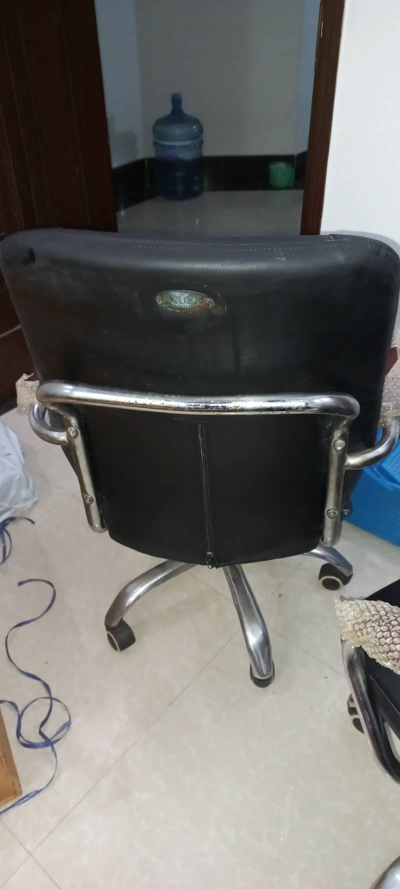 2 black revolving chairs + 1 damaged brown revolving chair 6