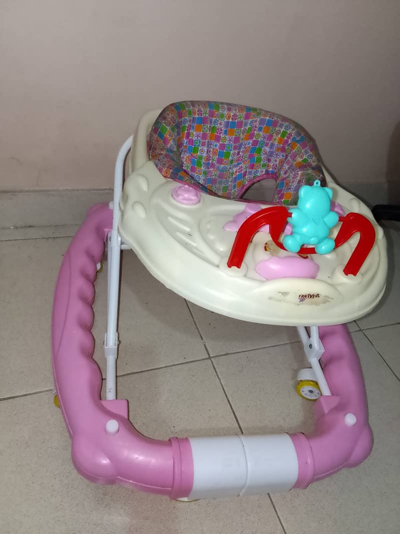 Baby Walker and a Play Mate just few month Used 0