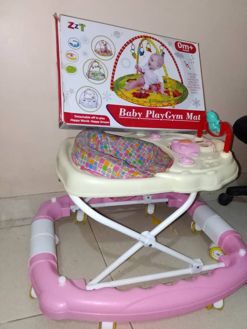 Baby Walker and a Play Mate just few month Used 1