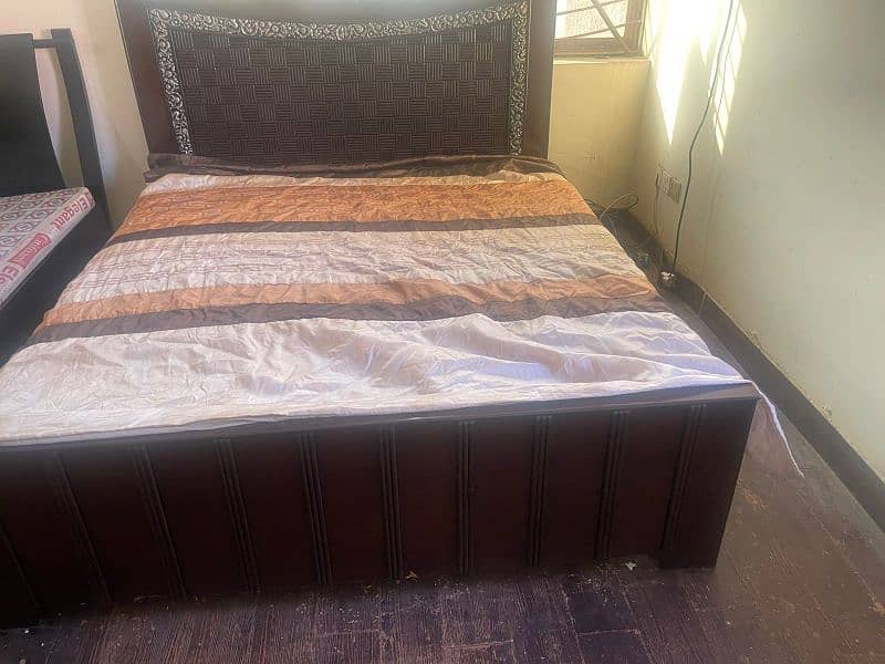 bed with side table and dressing 13