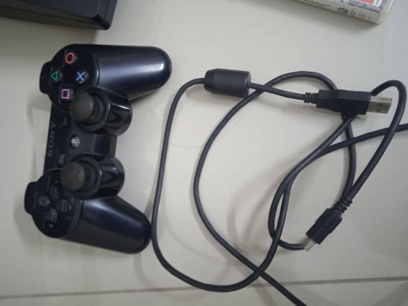 PS3 controller with 7 games 1