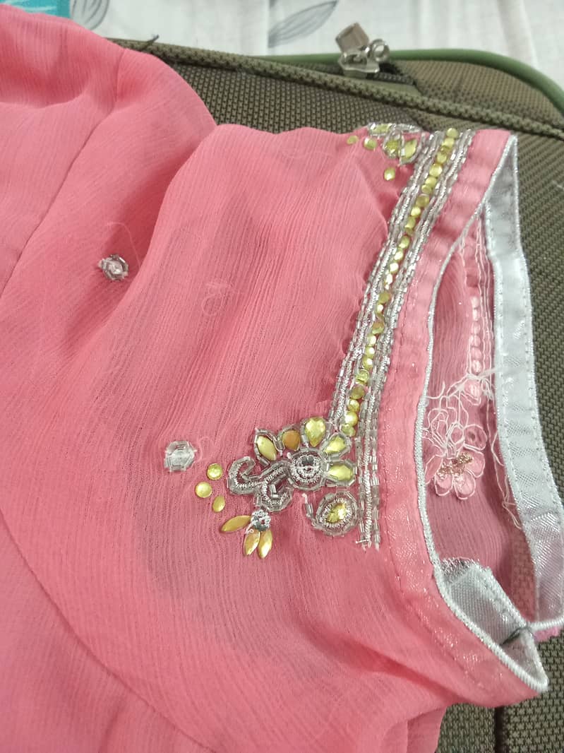 Pink chiffon embroided stiched saree. 4