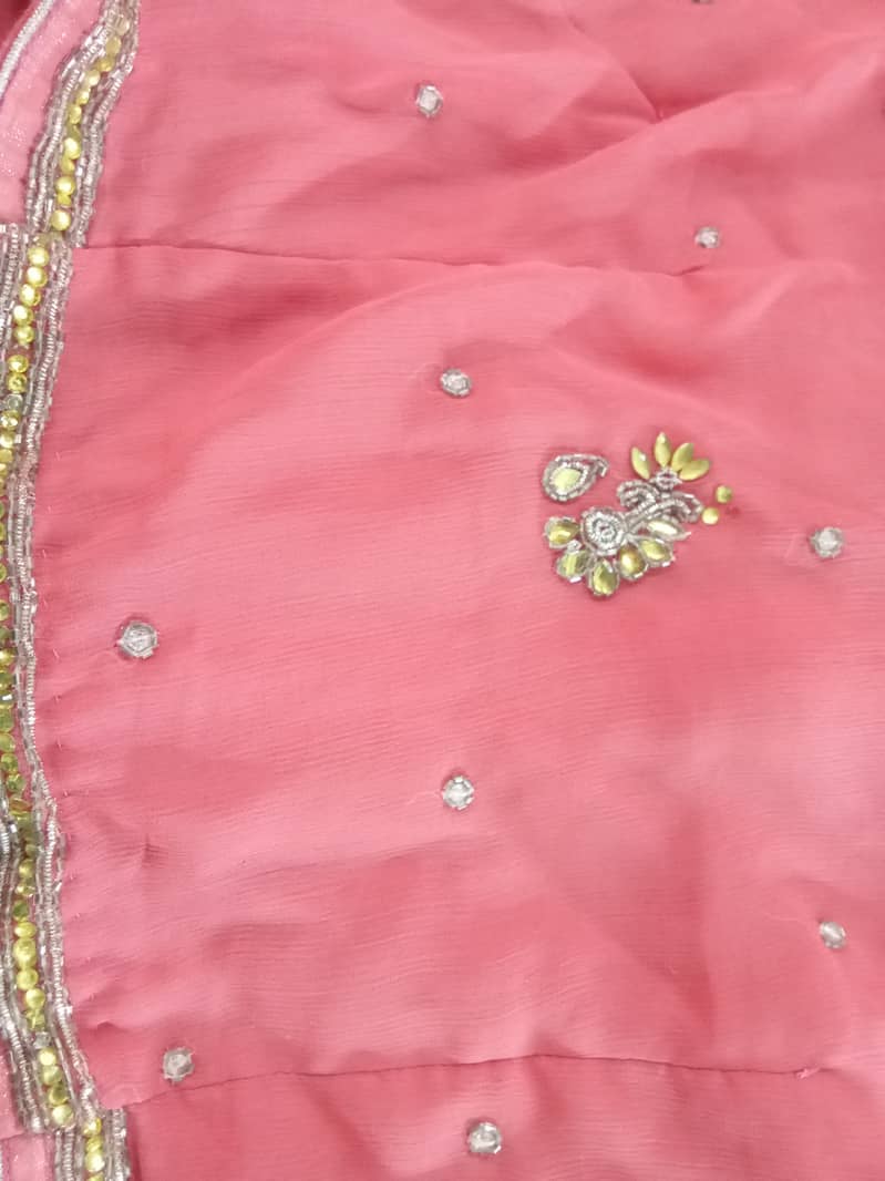 Pink chiffon embroided stiched saree. 6