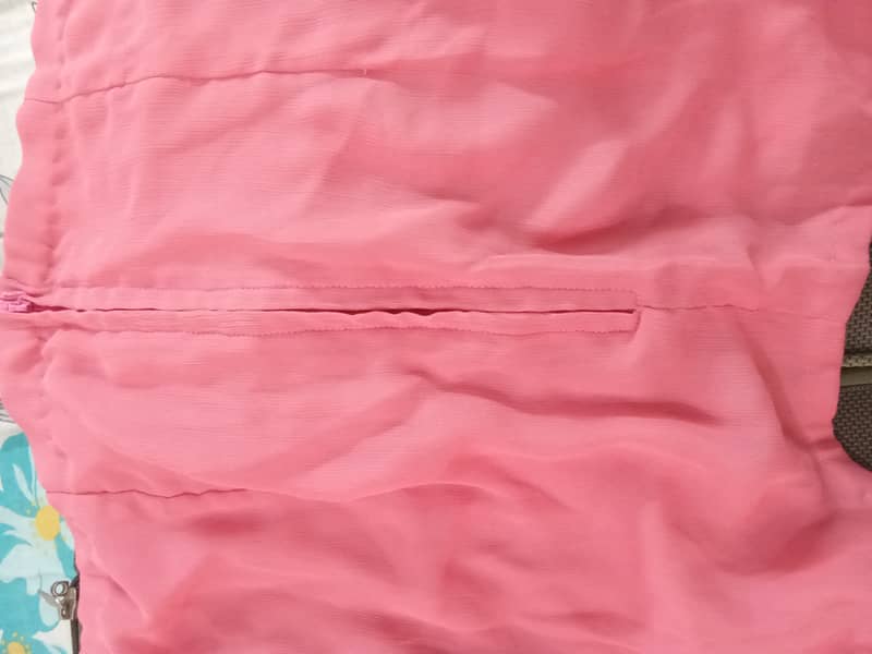 Pink chiffon embroided stiched saree. 8