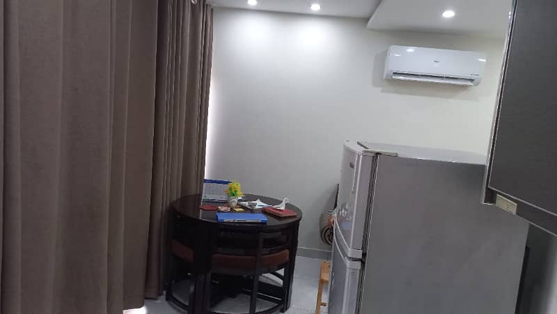 1 BED FULLY FURNISHED FULL LUXURY IDEAL BRAND NEW FLAT FOR RENT IN IDEAL LOCATION BAHRIA TOWN LAHORE 17