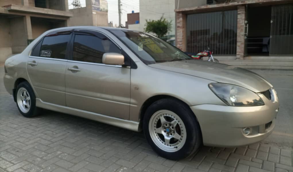 HOME USE LANCER GLX 1300CC(japani)VERY NEAT&CLEAN LIKE NEW 03009659991 2