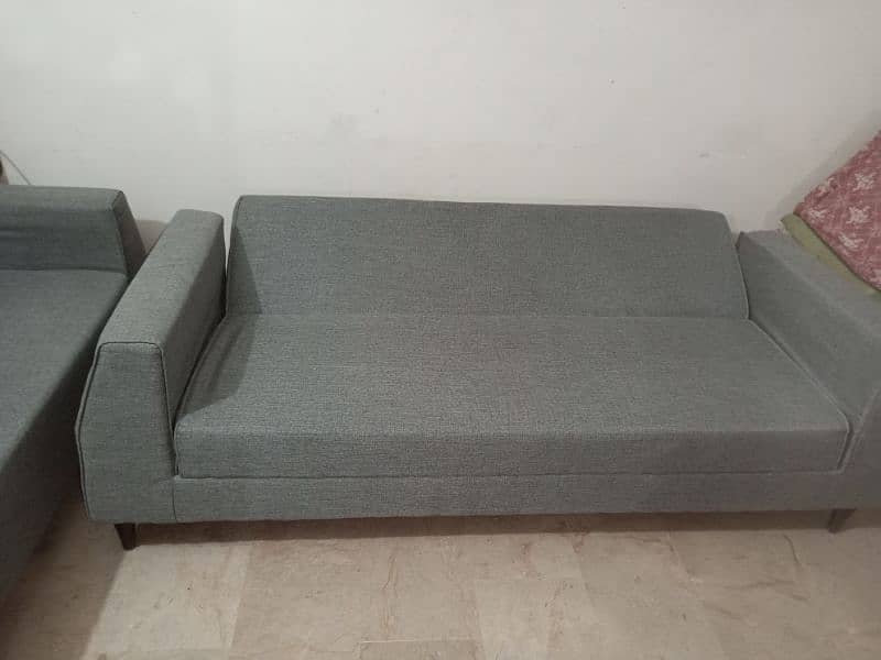 Grey sofa cumbed negotiable 1