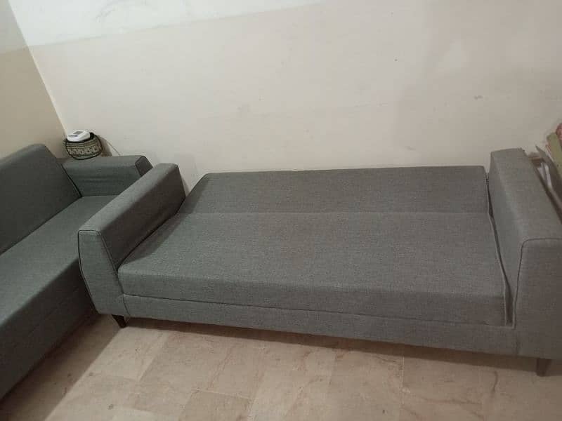 Grey sofa cumbed negotiable 2