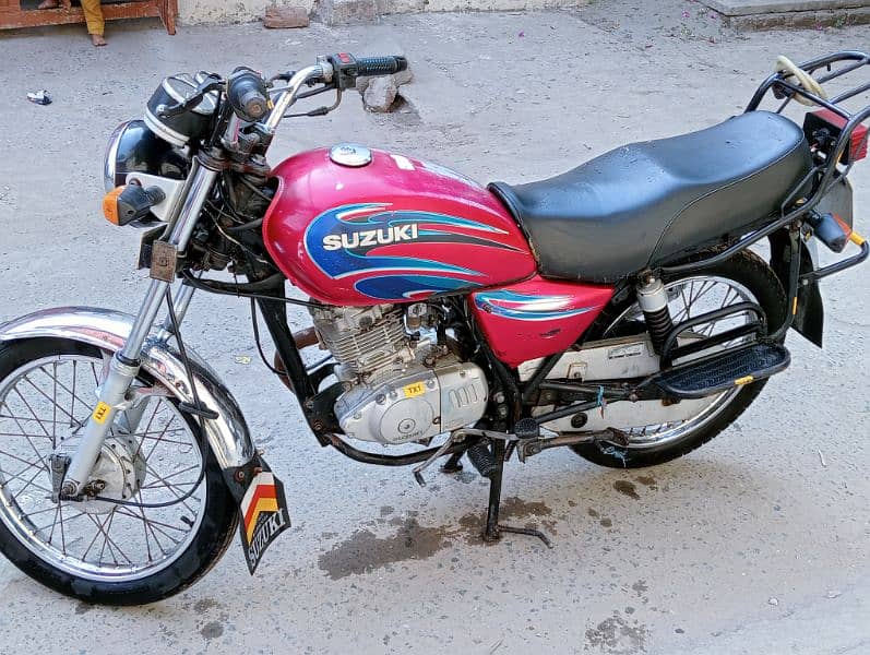 Suzuki 125 condition used ma copy file conplete 8