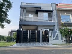 5 MARLA ULRA MODERN BEAUTIFUL HOUSE IS AVAILABLE FOR SALE IN DHA PHASE 11 RAHBAR SECTOR 2 0