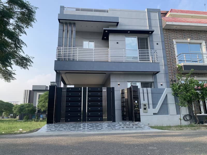 5 MARLA ULRA MODERN BEAUTIFUL HOUSE IS AVAILABLE FOR SALE IN DHA PHASE 11 RAHBAR SECTOR 2 0