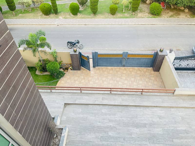 2 Kanal Facing Park Facing Canal Fully Furnished Triple Floor House with swimming pool, Mini Theater and Basement at the prime location of main Canal Road Babar Block, Bahria Town Lahore 7