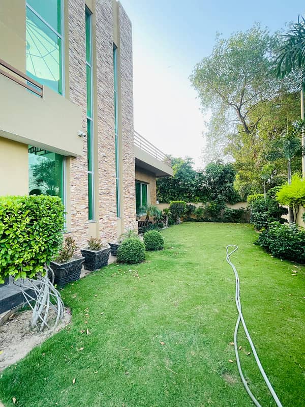 2 Kanal Facing Park Facing Canal Fully Furnished Triple Floor House with swimming pool, Mini Theater and Basement at the prime location of main Canal Road Babar Block, Bahria Town Lahore 8