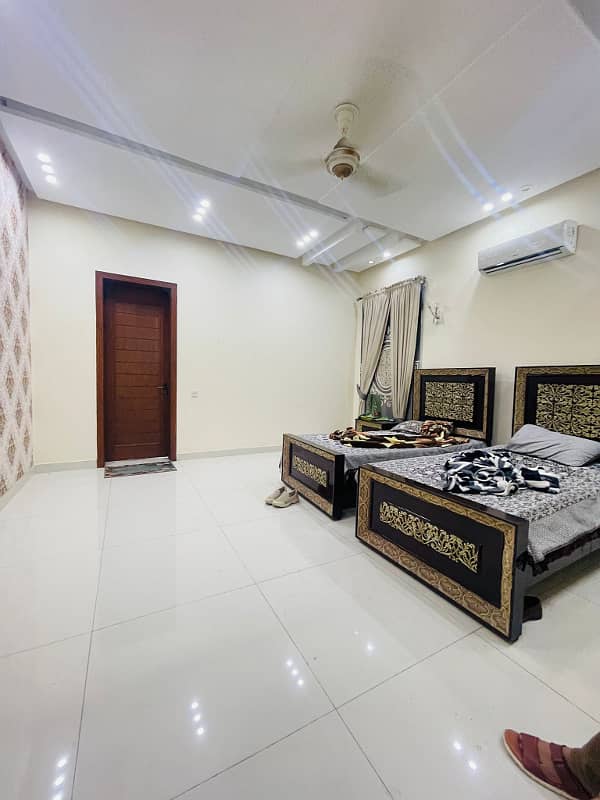 2 Kanal Facing Park Facing Canal Fully Furnished Triple Floor House with swimming pool, Mini Theater and Basement at the prime location of main Canal Road Babar Block, Bahria Town Lahore 35