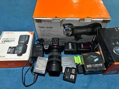 Sony A7 Riii with Lens FE 4/24-105 G OSS along Lights and stands