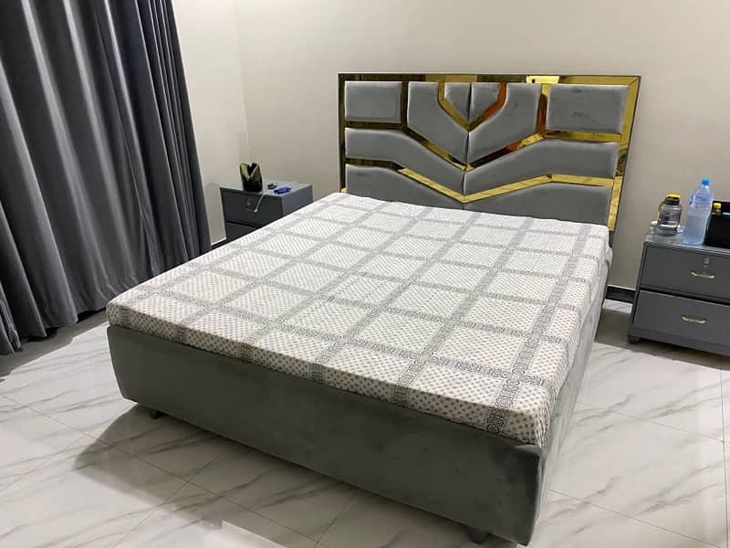 bed and mattress with side tables and dressing table 0