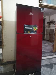 dawlance fridge sell new condtion medium saiz