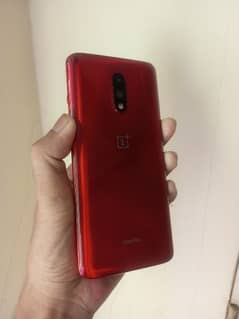 OnePlus 7 mobile and charger Snapdragon 855