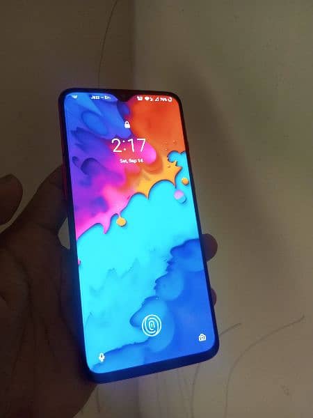 OnePlus 7 mobile and charger Snapdragon 855 1