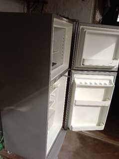 Dawlance Fridge medium size Fully Genuine and clean