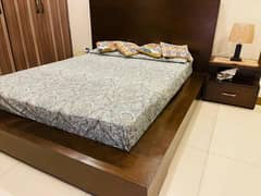 Bed with single side table and mattress