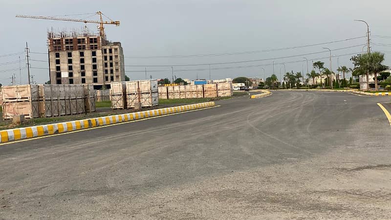 3 marla residential plot available for sale on main pine avenue road Edenabad 4