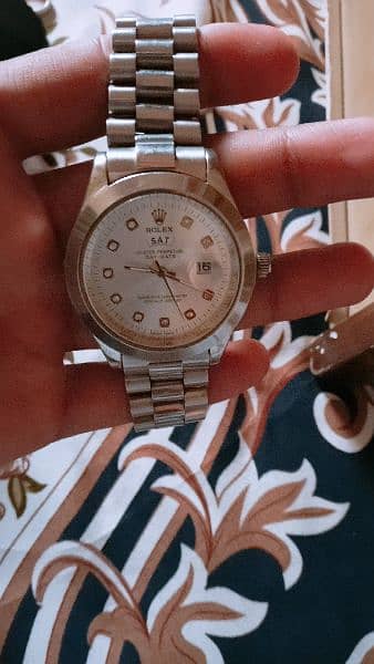 Rolex 3 in 1 time , date , and day. 3