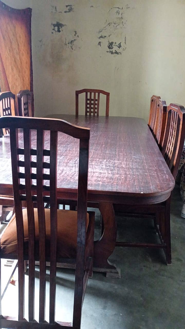 Dining table with eight chairs in well condition for sale 1