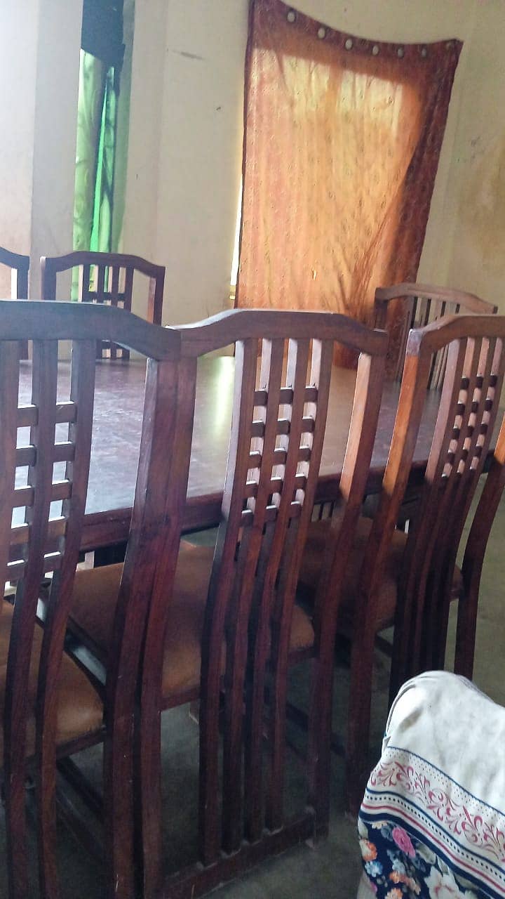 Dining table with eight chairs in well condition for sale 2