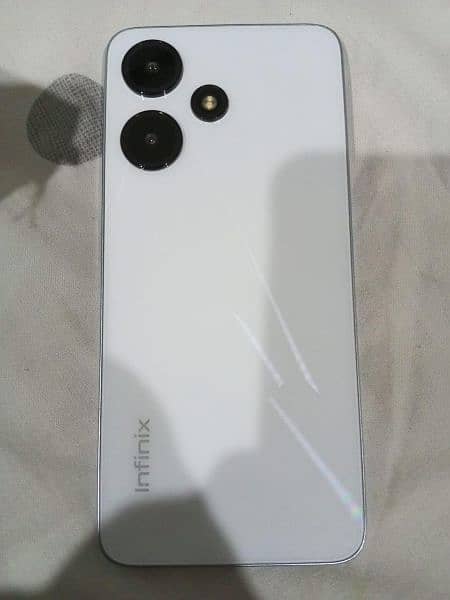 Infinix Hot 30i 16 128 condition 10 b 10 urgent sale 4 months warranty 2